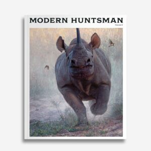 A photo of a running rhinoceros in nature featured on Modern Huntsman's latest issue, highlighting wildlife conservation and sustainable hunting practices.